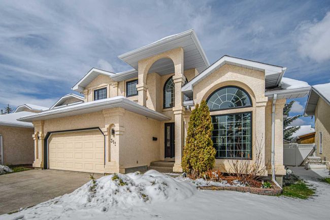 315 Hawkstone Close Nw, Home with 5 bedrooms, 3 bathrooms and 6 parking in Calgary AB | Image 1