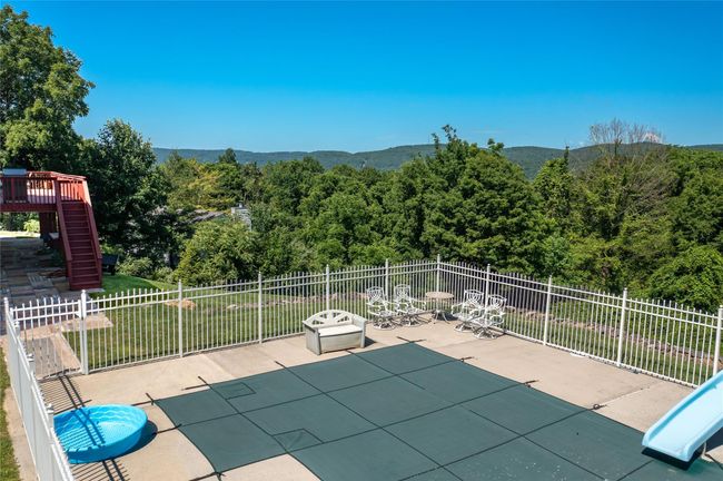 View of patio with stairs, a forest view, and a mountain view | Image 7
