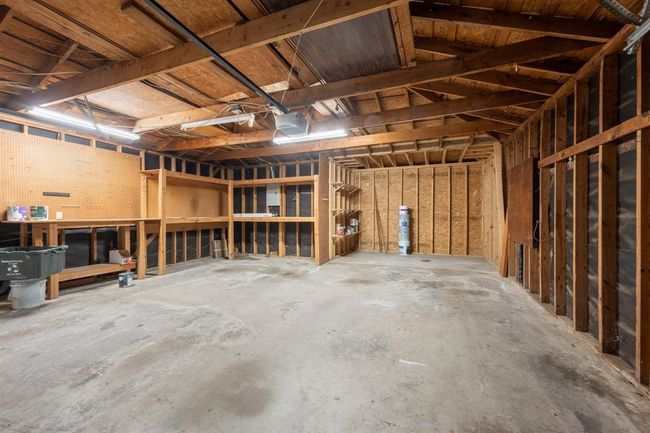 Garage extension adds extra length, providing ample space for a boat, extra storage, workshop, or your favorite DIY projects. | Image 34