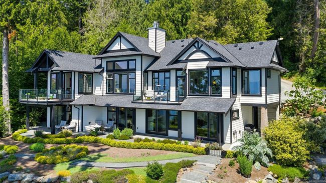 Rear view of property with stucco siding | Image 16