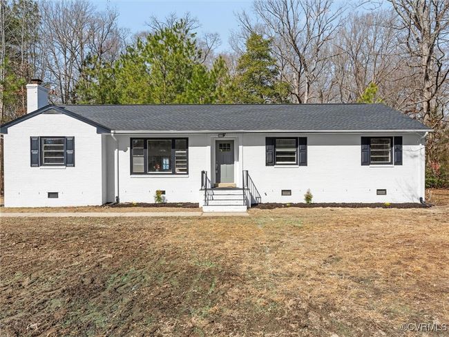 Ranch-style home featuring a shingled roof, crawl space, and brick siding | Image 40