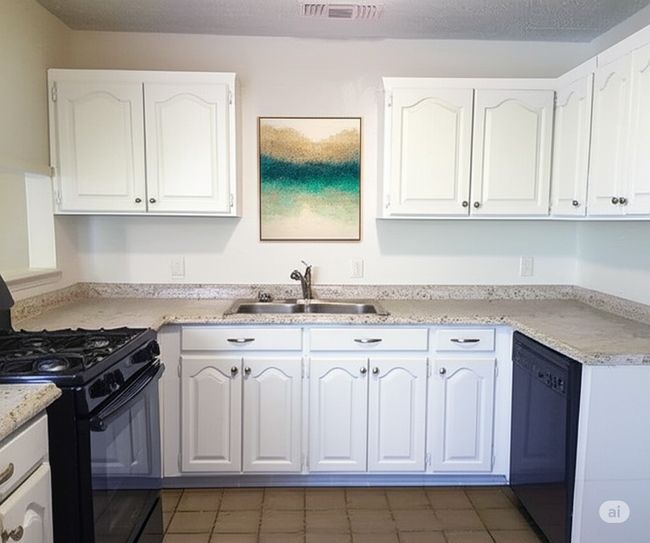Kitchen featuring black appliances, white cabinetry, and light countertops | Image 8
