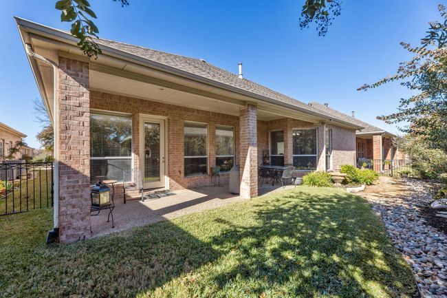 Back of house featuring a yard and a patio area | Image 23