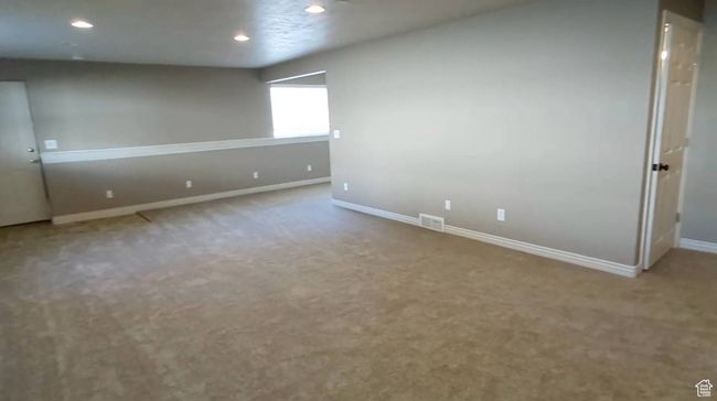Carpeted spare room featuring baseboards and recessed lighting | Image 53