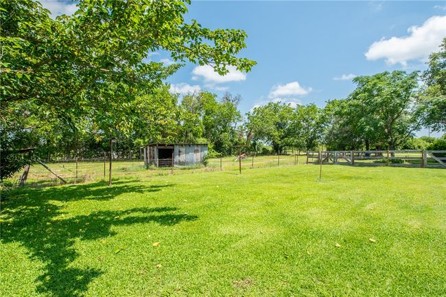 View of yard featuring an outbuilding | Image 38