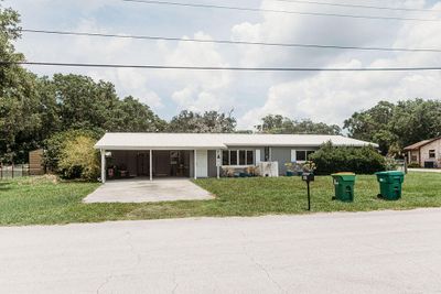 6033 Palm Street, House other with 4 bedrooms, 2 bathrooms and null parking in Mims FL | Image 3