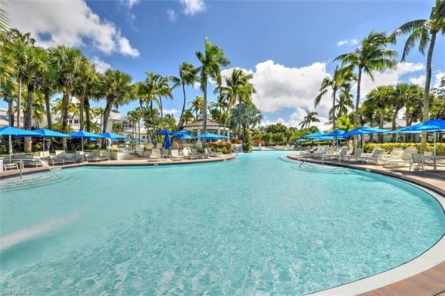 Community pool with a patio | Image 37