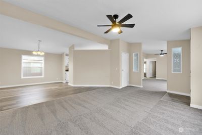 Looking into your second living area, enjoy all new flooring throughout the home. | Image 2