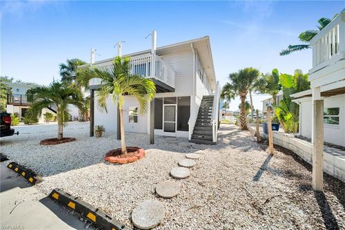 128 Eucalyptus Ct, FORT MYERS BEACH, FL, 33931-3616 | Card Image