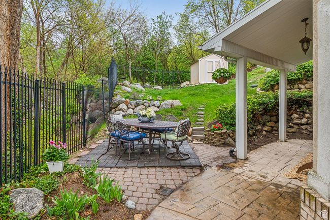 View of patio with a storage unit | Image 27