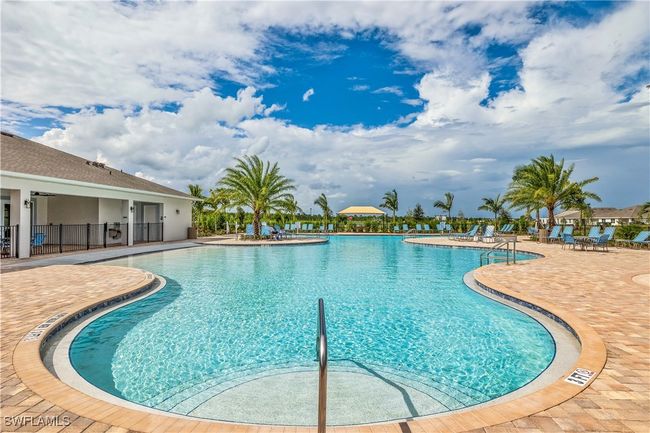 View of pool with a patio | Image 17