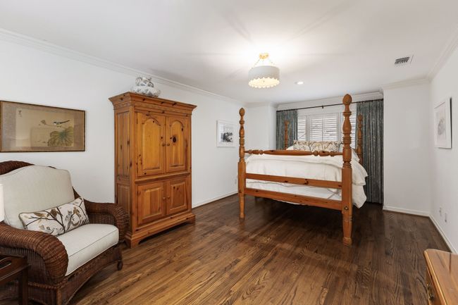 3rd Guest room with beautiful hardwood floors, plantation shutters and large window for natural light | Image 27