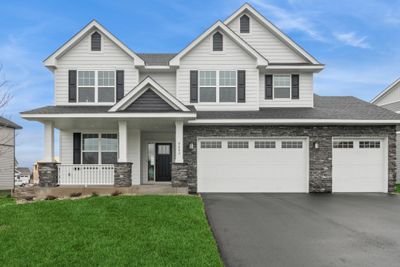 Photo is of the actual home. The Washburn has a stunning exterior! | Image 1