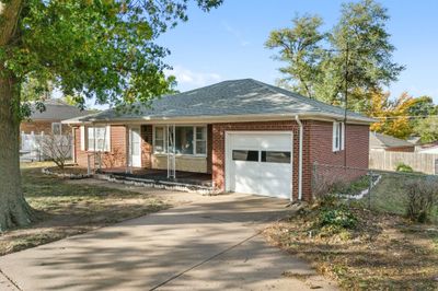 Ranch-style home with a garage | Image 3