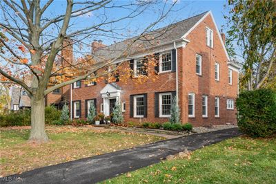 Colonial home with a front yard | Image 2