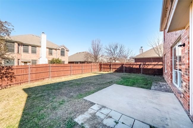 View of yard with a patio area and a fenced backyard | Image 35