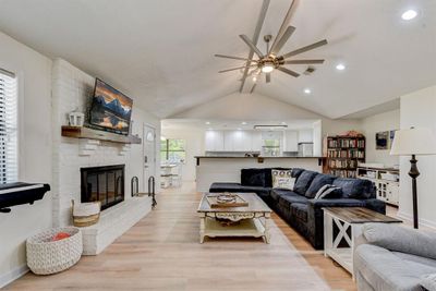 Large family area with fireplace. | Image 2