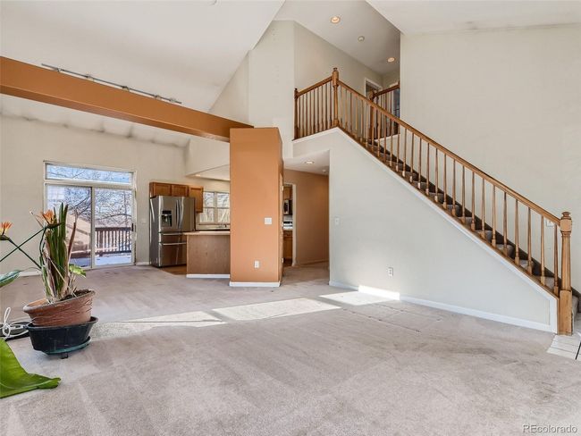 Living Room with vaulted ceilings and abundant natural light | Image 5