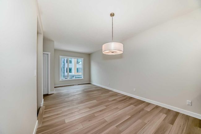 214 Shawnee Square Sw, Townhouse with 2 bedrooms, 3 bathrooms and 3 parking in Calgary AB | Image 13