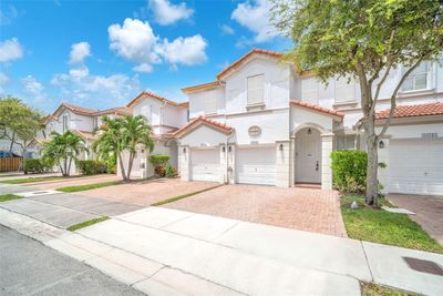 10749 - 10749 Nw 78th Ter, Townhouse with 4 bedrooms, 2 bathrooms and null parking in Doral FL | Image 1