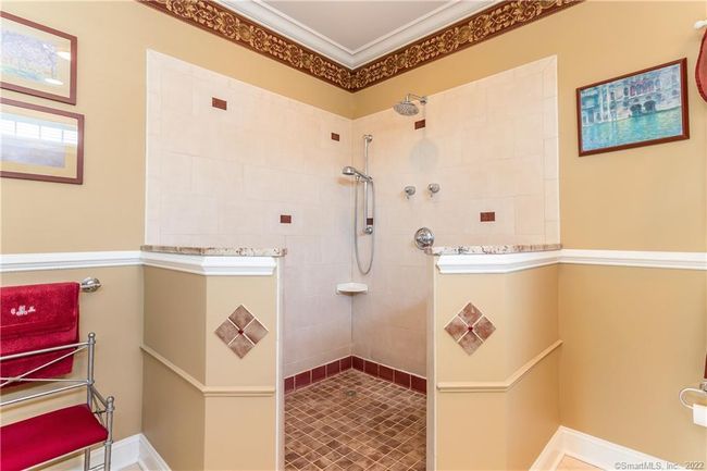 Oversized walk-in shower is practical and pretty. | Image 26