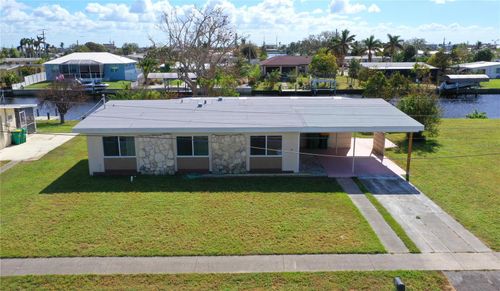 554 Lindley Ter, PORT CHARLOTTE, FL, 33952-8355 | Card Image