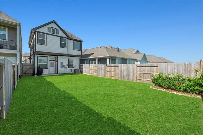 Private backyard with a patio area. | Image 21