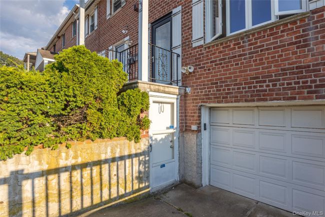 Property entrance with brick siding | Image 24