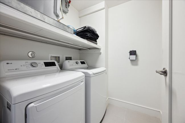 Who doesn't love a large laundry room? Great additional storage. | Image 13