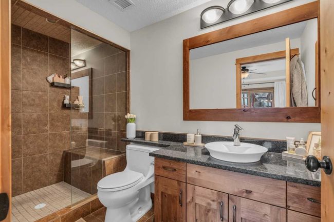 201 - 2100B Stewart Creek Dr, Condo with 2 bedrooms, 3 bathrooms and 1 parking in Canmore AB | Image 26