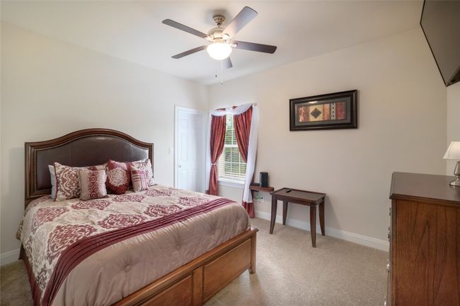 Another secondary bedroom with a great size closet and of course, plenty of natural light. | Image 24