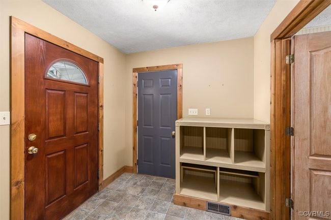 Entryway featuring a textured ceiling | Image 39
