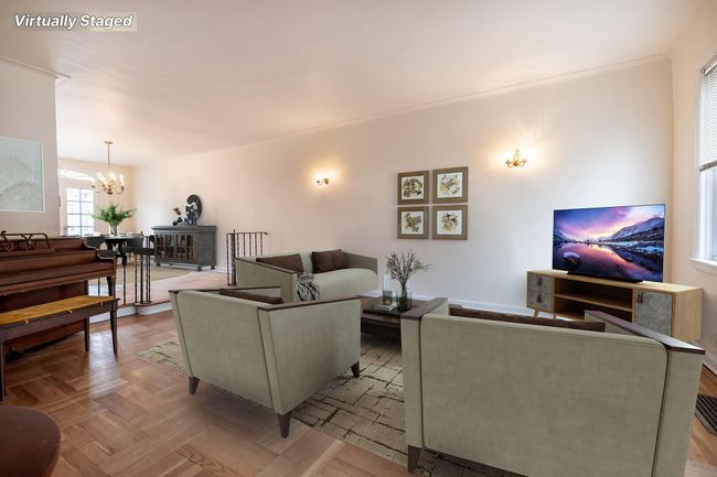 Living area featuring a notable chandelier | Image 6