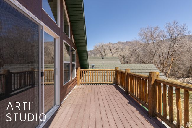 Wooden terrace featuring a mountain view | Image 38