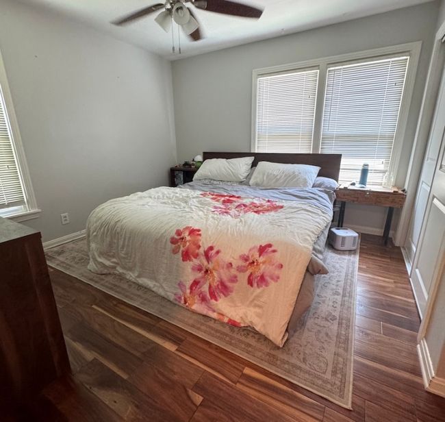 Primary bedroom is situated at the back of the house. | Image 8