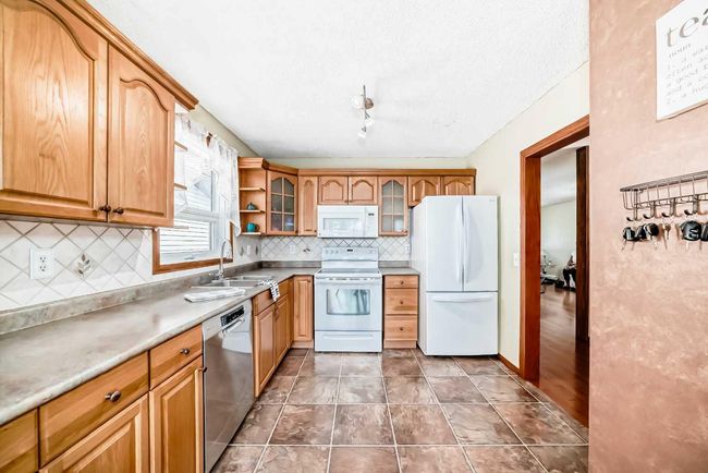 440 Big Springs Drive Se, House other with 3 bedrooms, 2 bathrooms and 1 parking in Airdrie AB | Image 4