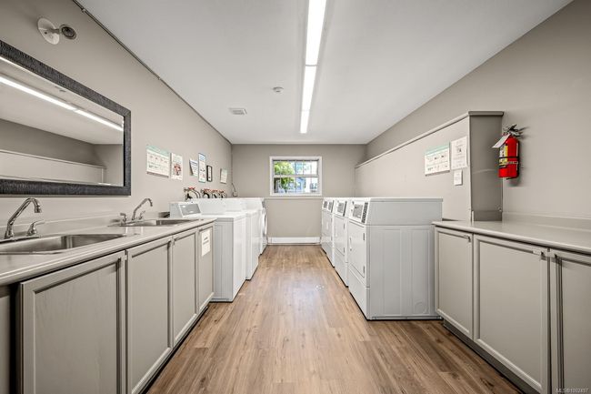 COMMON LAUNDRY ROOM CONVENIENTLY LOCATED BESIDE THE UNIT | Image 36