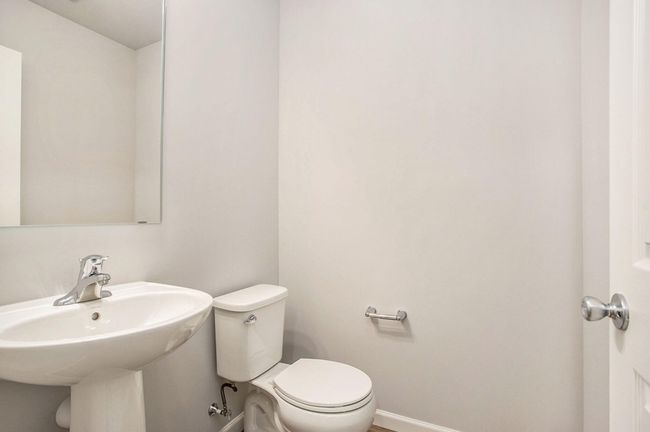 First floor powder room is centrally located and easy for guests to use. | Image 8