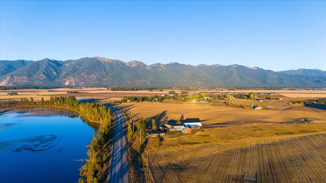 View of mountain feature featuring a water view and a rural view | Image 56