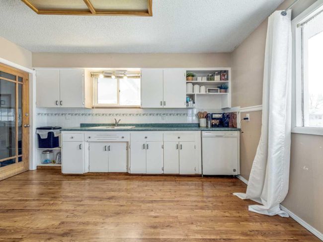 4902 62 Avenue, Home with 4 bedrooms, 2 bathrooms and 2 parking in Taber AB | Image 7