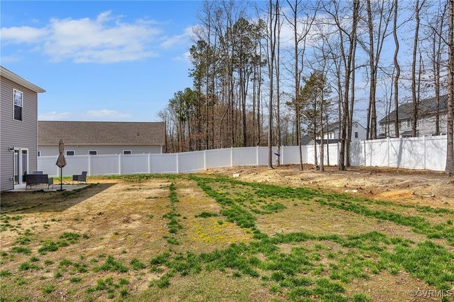 View of yard featuring a fenced backyard | Image 23