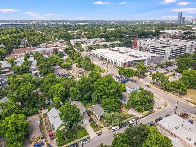 Drone / aerial view of a tree filled landscape | Image 7