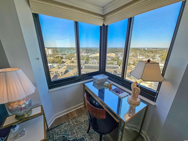 Office space with baseboards, ornamental molding, and wood finished floors | Image 20
