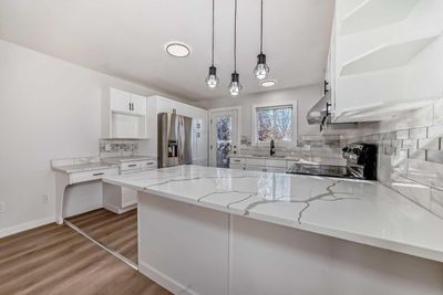 32 Dovista Crt Se, Home with 4 bedrooms, 2 bathrooms and 2 parking in Calgary AB | Image 2