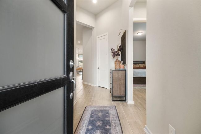 Beautiful formal entry with two bedrooms and a full bath to your right. | Image 4