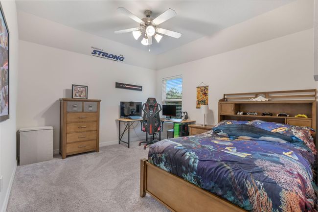 A cozy setup perfect for a personal retreat or gaming space. | Image 38
