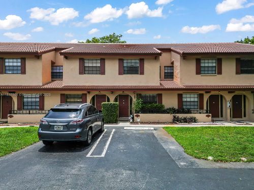e1-10942 W Sample Rd, Coral Springs, FL, 33065-7064 | Card Image