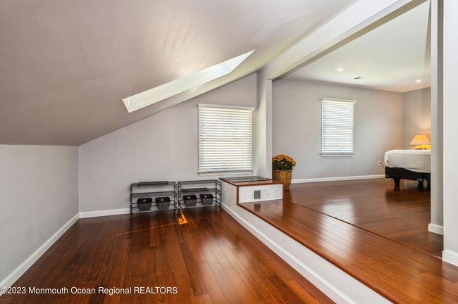 Alcove off of Bedroom has two skylights and is perfect seating area or office space | Image 19