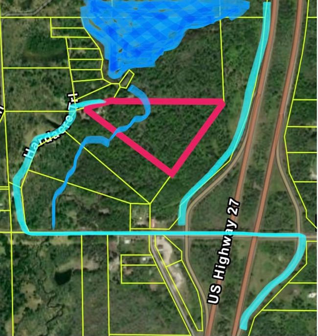 17.29 Acres in red triangle. Snowbowl Road exit. | Image 4