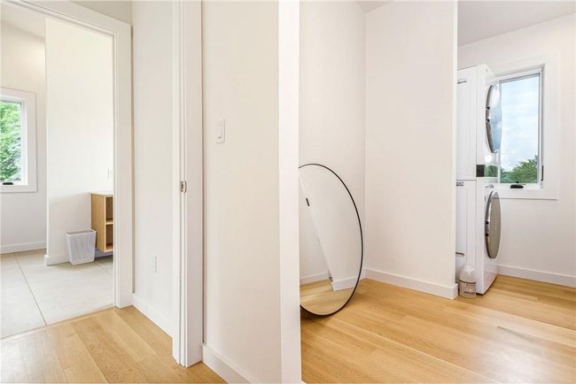Expansive Walk In Closet and Laundry | Image 27